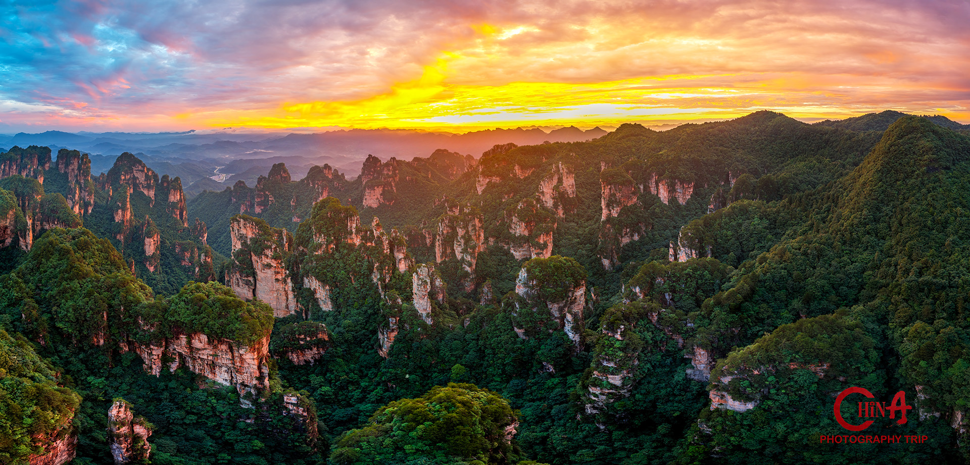 The towering sandstone pillar at Yuanjiajie known as the floating mountain, cloud below